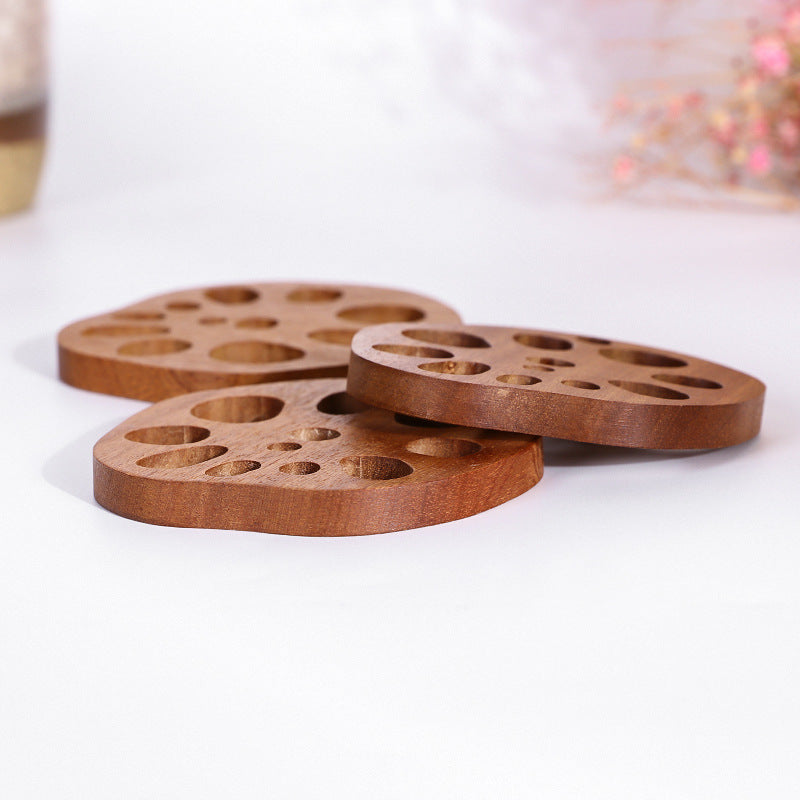 Roti – Lotus-Untersetzer aus Sandelholz